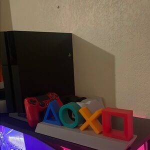 Sony PlayStation 4 Console with Red Controller and light